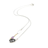 Teardrop black onyx necklace with pink sapphire in silver bezel and prongs setting