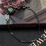 Oval Labradorite pendant bracelet with silver leaf shape on sterling silver chain