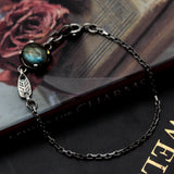 Oval Labradorite pendant bracelet with silver leaf shape on sterling silver chain