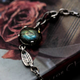 Oval Labradorite pendant bracelet with silver leaf shape on sterling silver chain