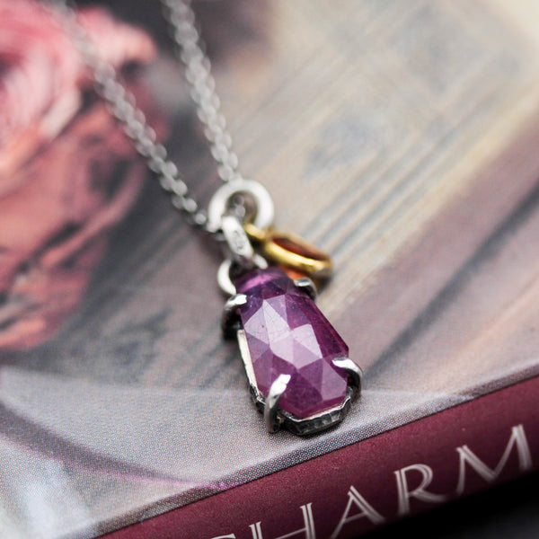 Teardrop faceted Pink sapphire pendant necklace in silver bezel and prongs setting with sterling silver chain