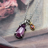 Teardrop faceted Pink sapphire pendant necklace in silver bezel and prongs setting with sterling silver chain