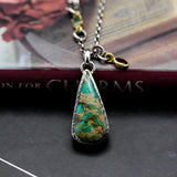 Teardrop Turquoise pendant necklace in silver bezel setting with sterling silver chain