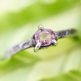 Faceted pink spinel ring in silver bezel and prongs setting with sterling silver texture band