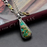 Teardrop Turquoise pendant necklace in silver bezel setting with sterling silver chain