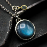 Round cabochon Labradorite pendant necklace in silver bezel setting with green multi sapphire gemstone