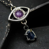 Silver Evil eyes pendant necklace with pink sapphire and blue kyanite gemstone on sterling silver chain