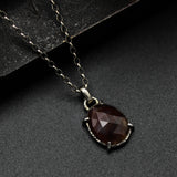 Oval faceted Moss agate pendant necklace in silver bezel and prongs setting with sterling silver chain