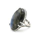 Oval cabochon blue Labradorite cocktail ring in silver bezel and prongs setting with sterling silver band