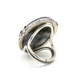 Oval cabochon blue Labradorite cocktail ring in silver bezel and prongs setting with sterling silver band