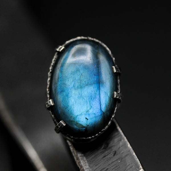 Natural blue Labradorite cocktail ring in silver bezel and prongs setting with sterling silver band