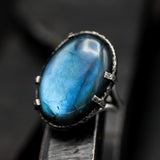 Natural blue Labradorite cocktail ring in silver bezel and prongs setting with sterling silver band