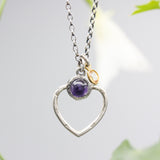 Round Amethyst gemstone necklace in silver bezel setting with silver heart shape and oxidized sterling silver chain