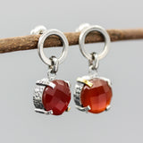Round faceted Carnelian earrings in silver bezel and prongs setting with circle loop on sterling silver stud style