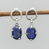 Oval fceted Lapis Lazuli earrings in silver bezel and prongs setting with circle loop on sterling silver stud style
