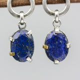 Oval fceted Lapis Lazuli earrings in silver bezel and prongs setting with circle loop on sterling silver stud style