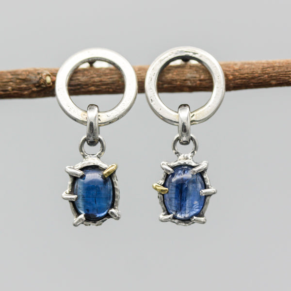 Oval cabochon Blue Kyanite earrings in silver bezel and prongs setting with circle loop on sterling silver stud style