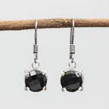 Round faceted black onyx earrings in silver bezel and prongs setting on sterling silver hooks style