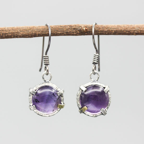 Round cabochon Amethyst earrings in silver bezel and prongs setting on sterling silver hooks style