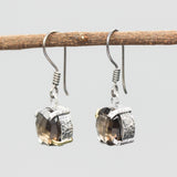 Round faceted smoky quartz earrings in silver bezel and prongs setting on sterling silver hooks style