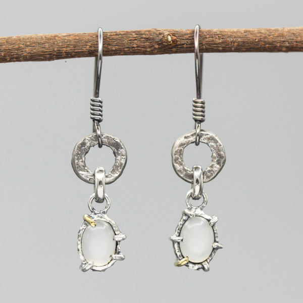 Oval Moonstone earrings in silver bezel and prongs setting with silver texture circle loop on hooks style