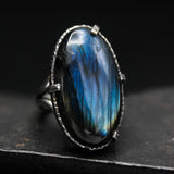 Oval dark blue natural Labradorite cocktail ring with sterling silver band