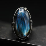 Oval dark blue natural Labradorite cocktail ring with sterling silver band