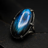 Oval dark blue natural Labradorite cocktail ring with sterling silver band