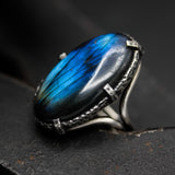 Oval dark blue natural Labradorite cocktail ring with sterling silver band