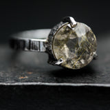 Round Rutilated quartz ring in bezel and prongs setting with sterling silver texture oxidized band