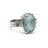 Mint kyanite ring in silver bezel and prongs setting with sterling silver texture flat design band