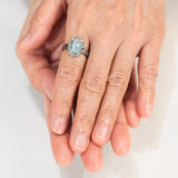 Mint kyanite ring in silver bezel and prongs setting with sterling silver texture flat design band