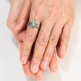 Green kyanite ring in silver bezel and prongs setting with sterling silver texture flat design band