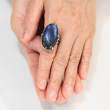 Oval dark blue natural Labradorite cocktail ring with sterling silver band