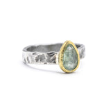 Teardrop mint kyanite ring in brass bezel  setting with sterling silver hard texture band