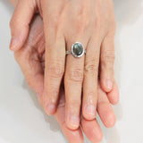 Oval Labradorite ring in silver bezel setting with sterling silver oxidized texture band