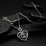 'The eye of Love' Sterling silver necklace in heart and The third eyes shape with oval blue kyanite, square green tourmaline secondary