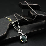 Green Emerald pendant necklace in silver bezel and prongs setting