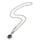 Green Emerald pendant necklace in silver bezel and prongs setting