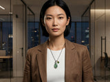 Green kyanite necklace worn with a white top and brown blazer