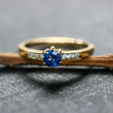 Wedding rings, round faceted Blue sapphire and diamonds with 22k gold band