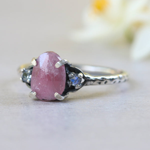 Ruby ring with moonstone side set gems in prongs setting with sterling silver oxidized texture band