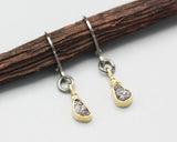 Rough diamond earrings in 18k gold bezel setting with oxidized sterling silver hooks style on the top