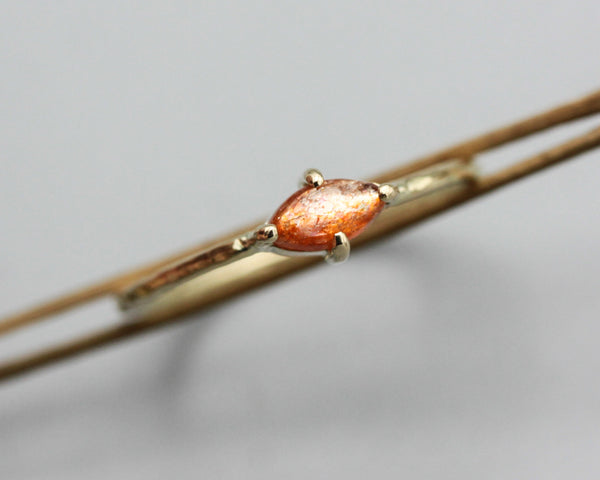 Marquise Sunstone ring in 4 prongs setting with 14k gold texture band