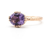 Amethyst cocktail ring in prongs setting with 14k rose gold texture design band