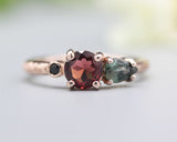 14k Rose gold wedding ring with Garnet, Green tourmaline, black spinel gemstone in bezel and prongs setting