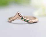 14k Rose gold with geometric design band ring with tiny 3 emerald on the side