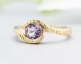 Bypass style ring 14k gold line texture design with round faceted Amethyst at the center