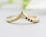 14k gold with line texture design band ring with tiny 3 blue sapphire on the side