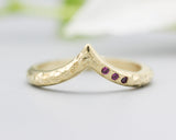 14k gold with hammer texture design band ring with tiny 3 ruby on the side